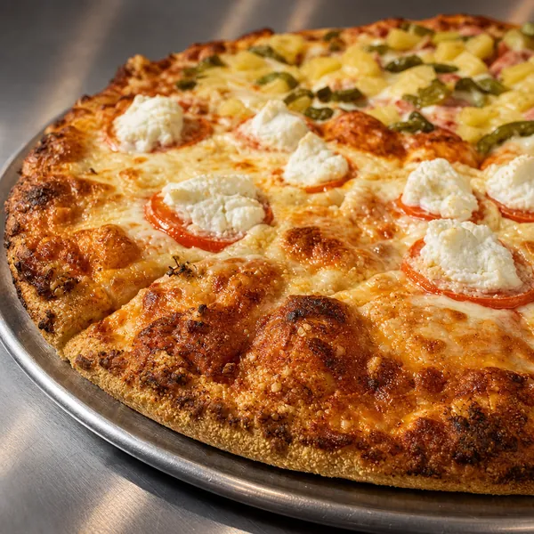 A pizza with ricotta, tomato, pineapple, and jalapeno.